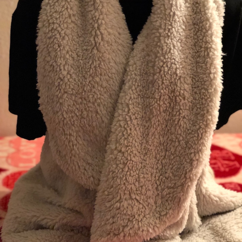 Cozy cream-colored sherpa vest
